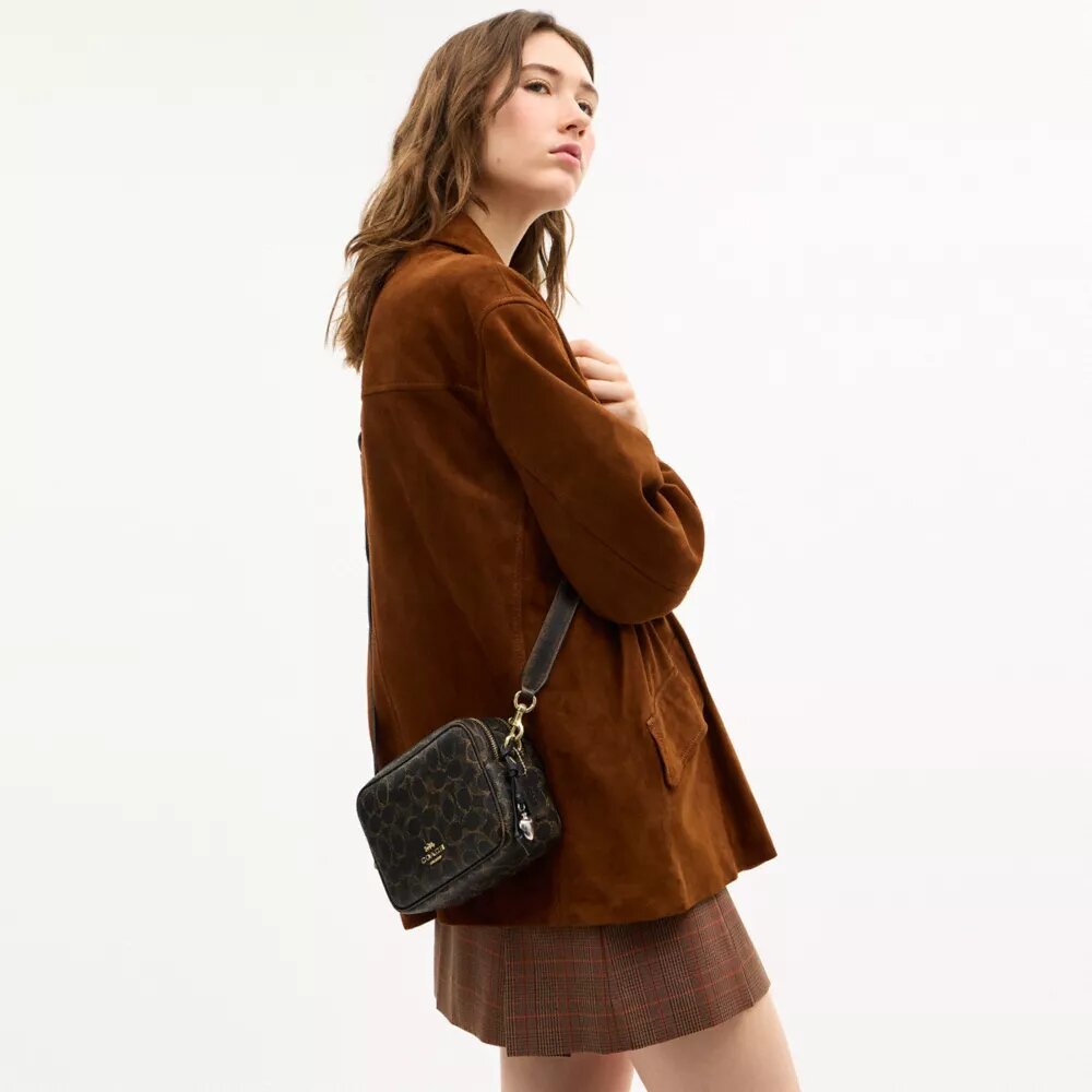 Borsa a tracolla Mini Carey in Signature Canvas