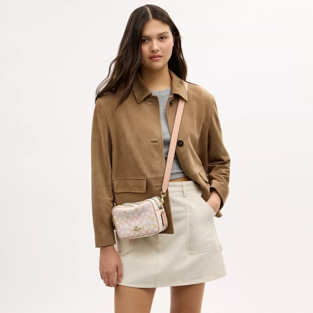 Borsa a tracolla Mini Carey in Signature Canvas