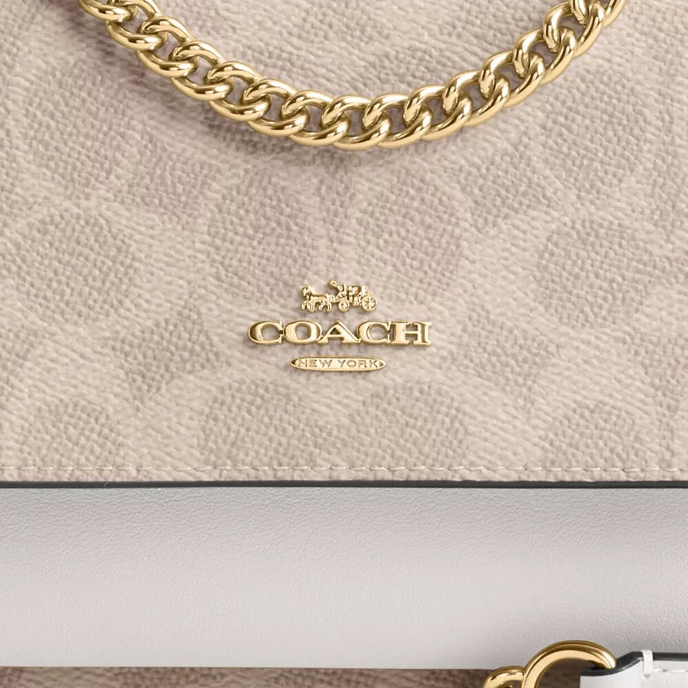 Borsa a tracolla Mini Klare in Signature Canvas