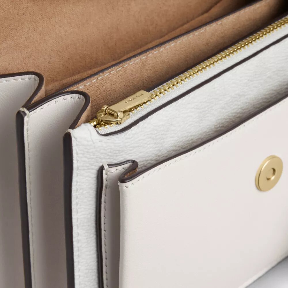 Borsa a tracolla Mini Klare in Signature Canvas