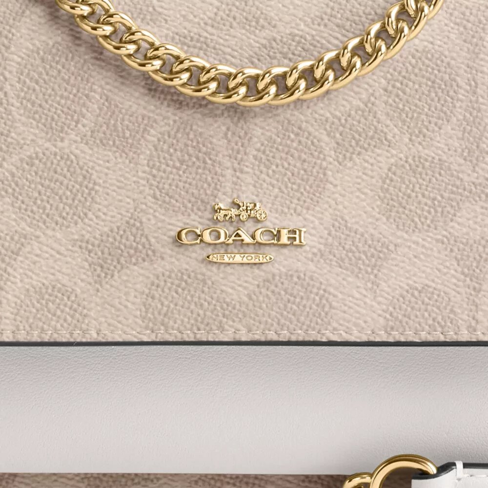 Borsa a tracolla Mini Klare in Signature Canvas