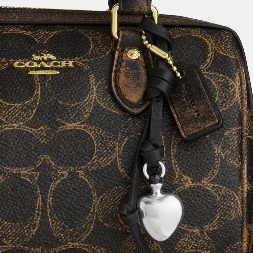 Borsa a tracolla Mini Rowan in Signature Canvas con ciondoli