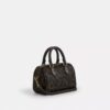 Borsa a tracolla Mini Rowan in Signature Canvas con ciondoli