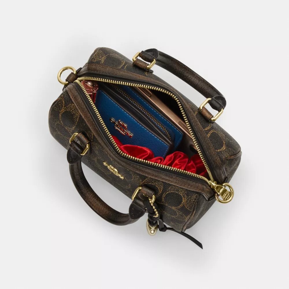 Borsa a tracolla Mini Rowan in Signature Canvas con ciondoli
