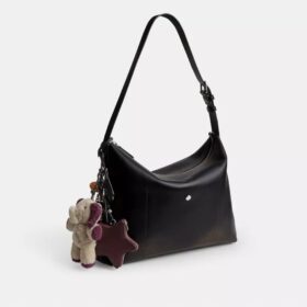 Borsa a tracolla Mott 38 in pelle invecchiata con ciondoli