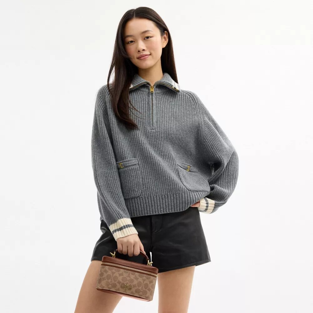 Borsa a tracolla Rainer 18 in Signature Canvas