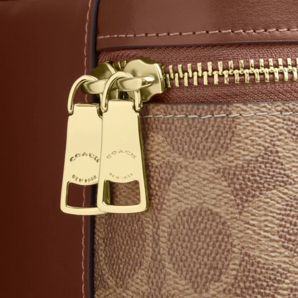 Borsa a tracolla Rainer 18 in Signature Canvas