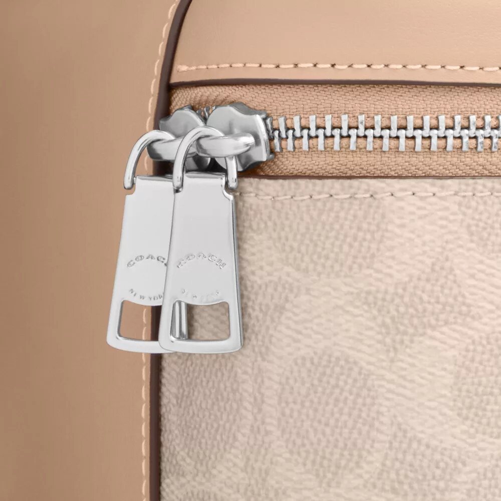 Borsa a tracolla Rainer 18 in Signature Canvas