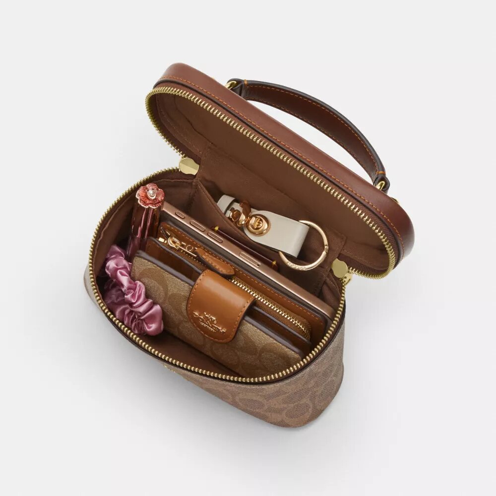 Borsa a tracolla Rainer 18 in Signature Canvas