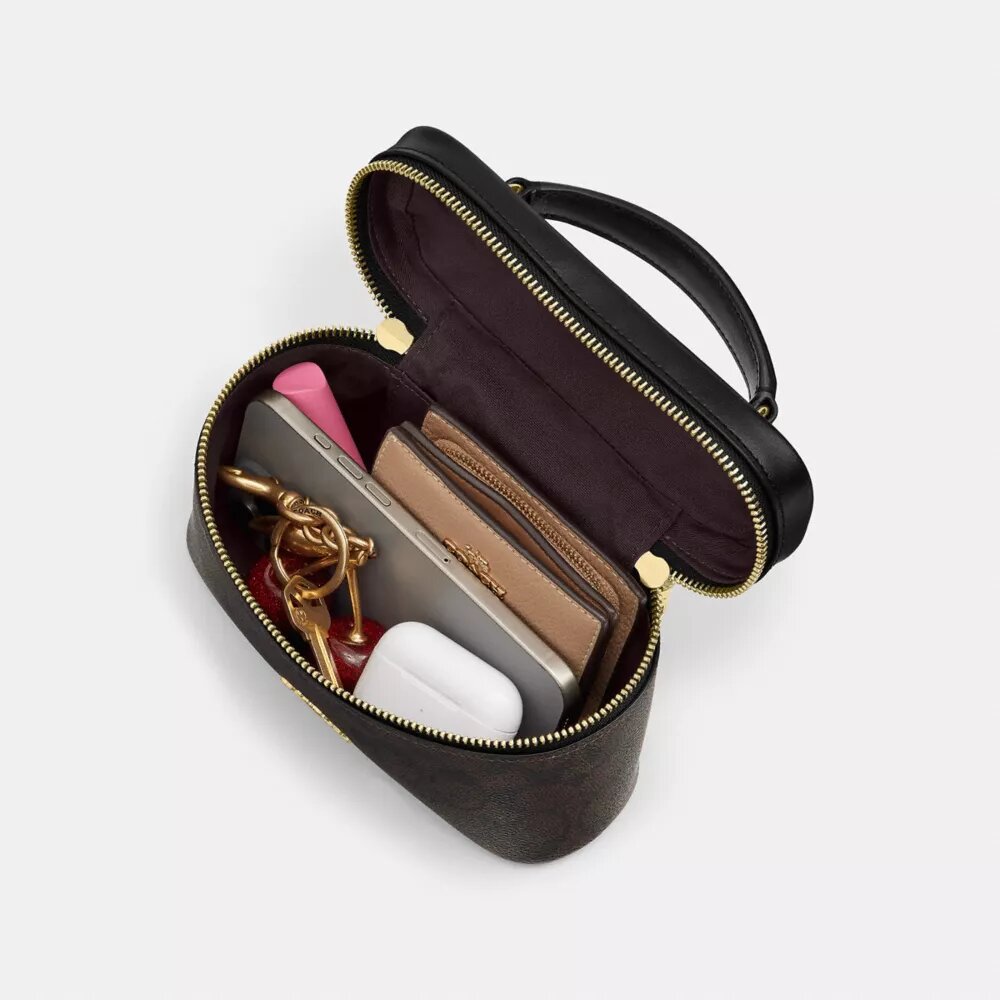 Borsa a tracolla Rainer 18 in Signature Canvas