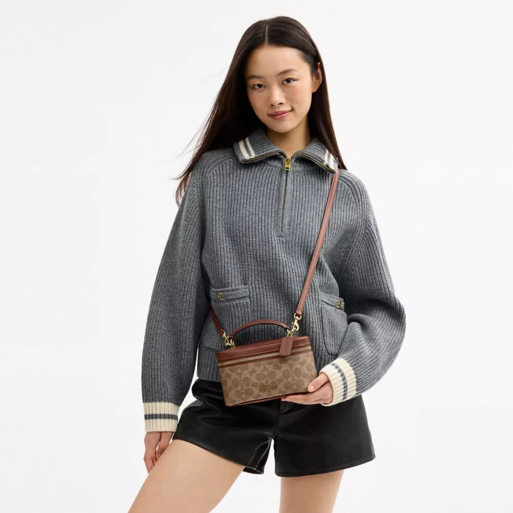 Borsa a tracolla Rainer 18 in Signature Canvas