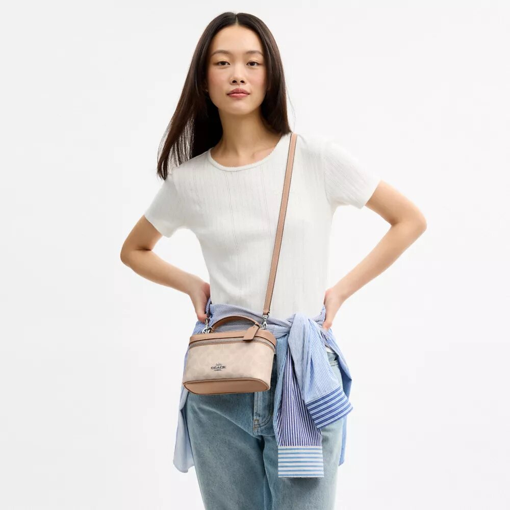 Borsa a tracolla Rainer 18 in Signature Canvas