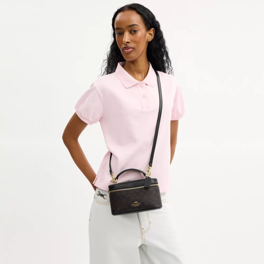 Borsa a tracolla Rainer 18 in Signature Canvas