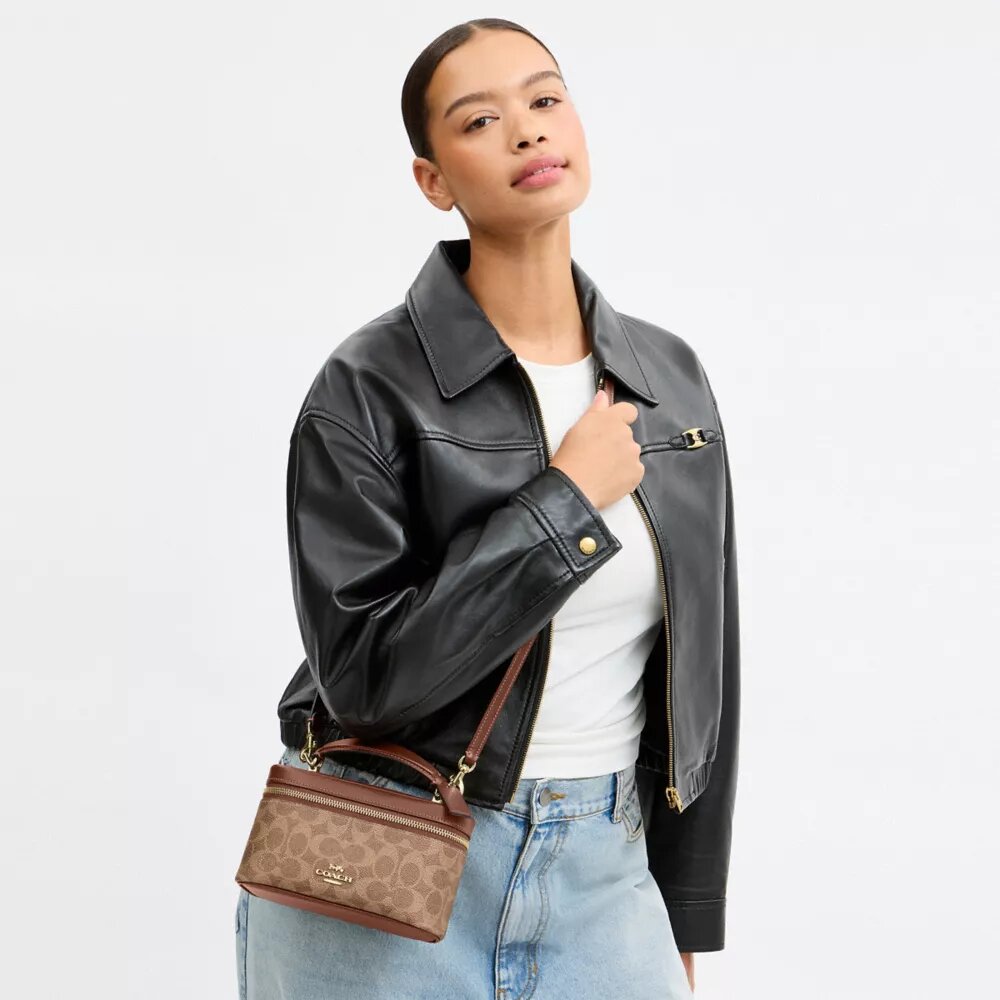 Borsa a tracolla Rainer 18 in Signature Canvas