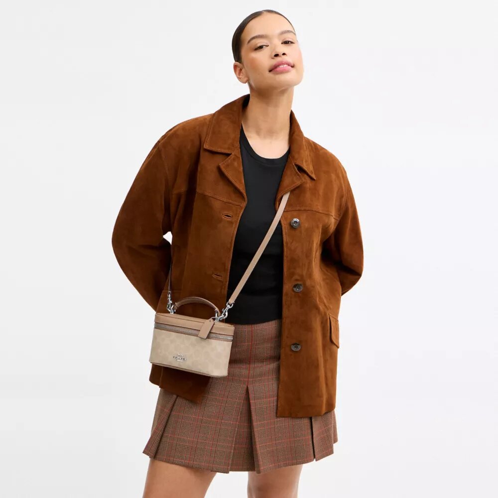Borsa a tracolla Rainer 18 in Signature Canvas