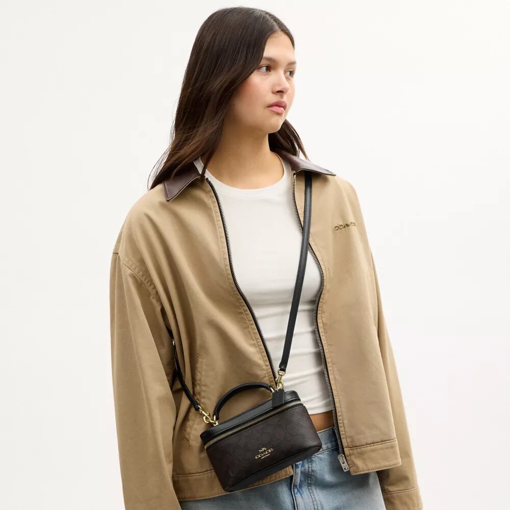 Borsa a tracolla Rainer 18 in Signature Canvas