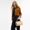 Borsa a tracolla Rowan in Signature Canvas a blocchi