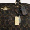 Borsa a tracolla Rowan in Signature Canvas con ciondoli