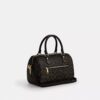 Borsa a tracolla Rowan in Signature Canvas con ciondoli