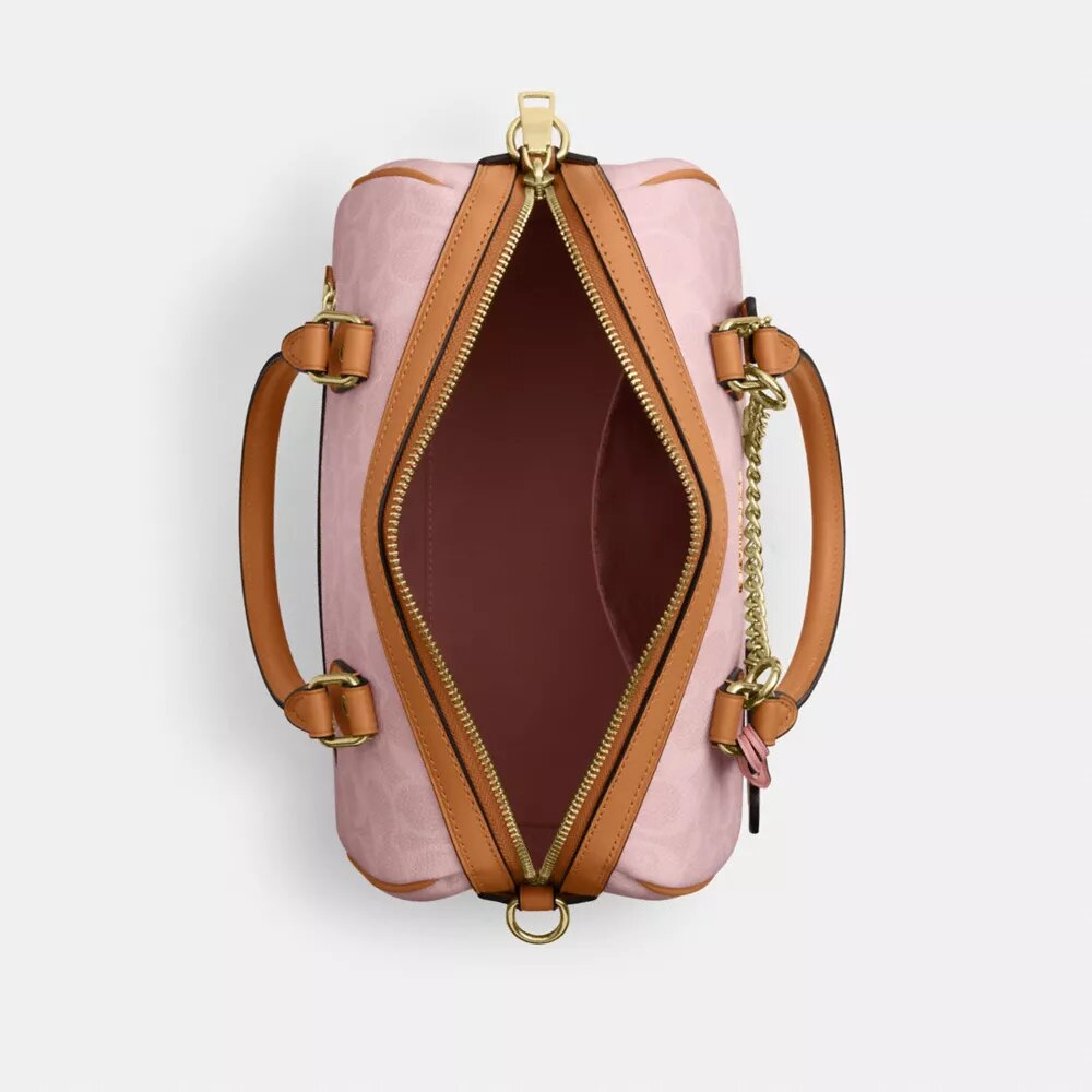 Borsa a tracolla Rowan in Signature Canvas con ciondoli