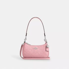 Borsa a tracolla Teri Mini in pelle firmata con ciondolo a forma di cuore