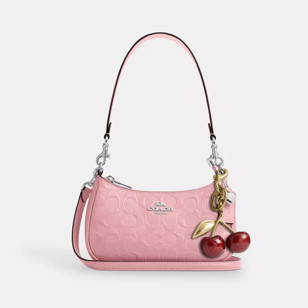 Borsa a tracolla Teri Mini in pelle firmata con ciondolo a forma di cuore