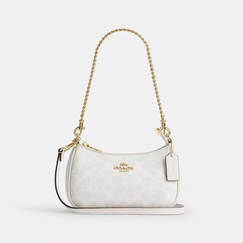Borsa a tracolla Teri Mini in Signature Canvas