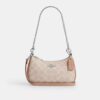 Borsa a tracolla Teri Mini in Signature Canvas
