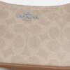 Borsa a tracolla Teri Mini in Signature Canvas