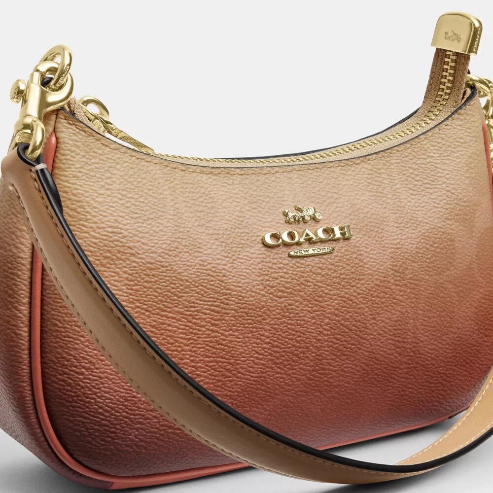 Borsa a tracolla Teri Mini in Signature Canvas