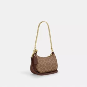 Borsa a tracolla Teri Mini in Signature Canvas