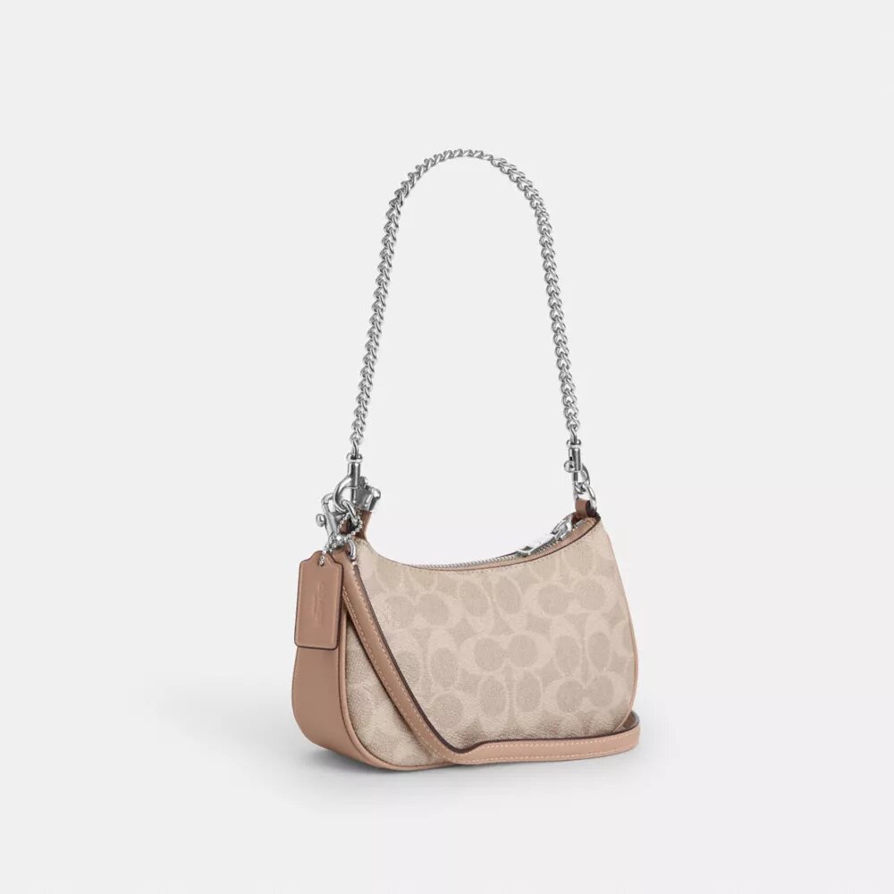 Borsa a tracolla Teri Mini in Signature Canvas
