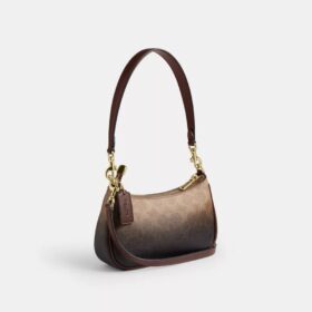 Borsa a tracolla Teri Mini in Signature Canvas
