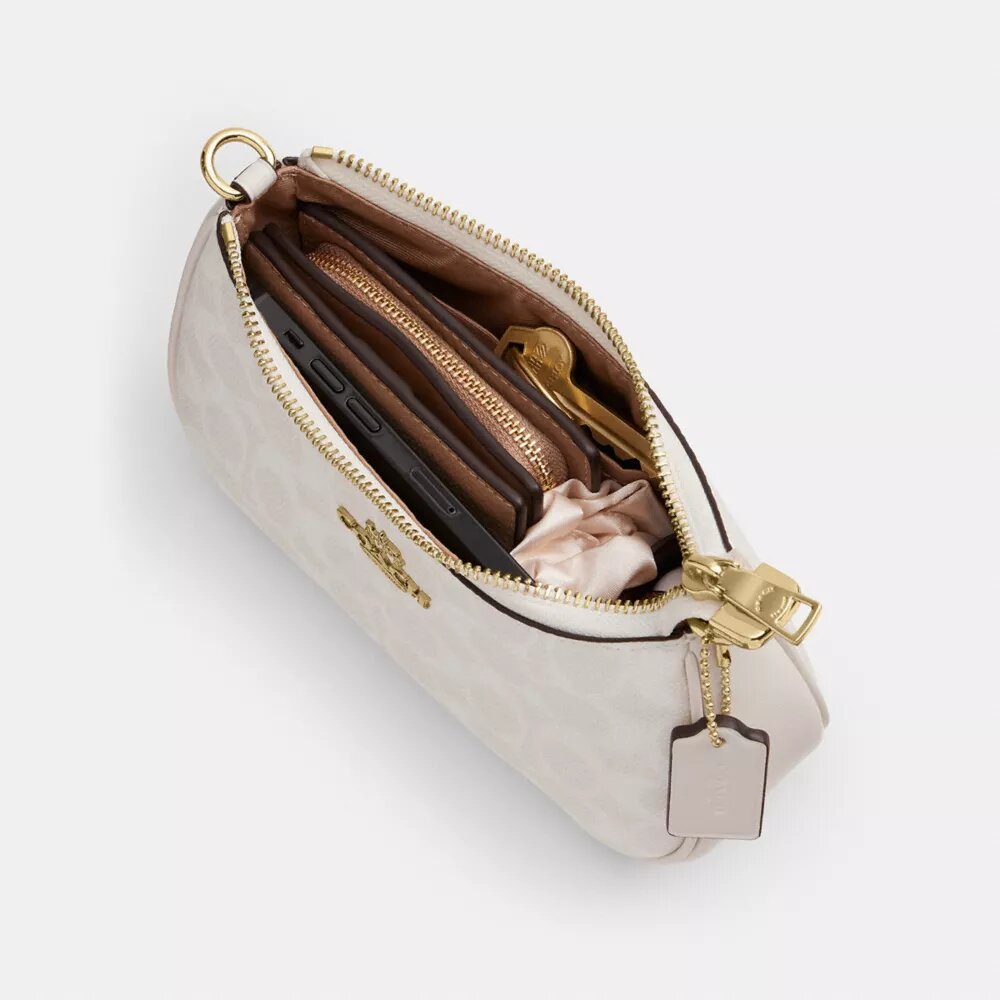 Borsa a tracolla Teri Mini in Signature Canvas