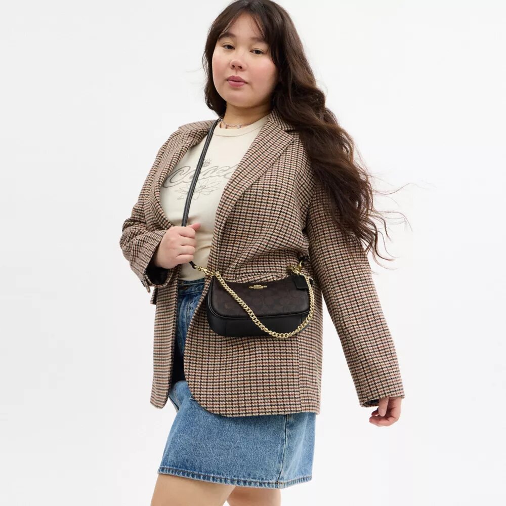 Borsa a tracolla Teri Mini in Signature Canvas