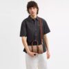Borsa Compass 25 in Signature Canvas
