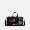 Borsa Compass 35 Disney X Coach con Pluto