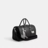 Borsa Compass 35 Disney X Coach con Pluto