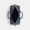 Borsa Compass 35 in denim di cotone rigenerativo con ciondoli