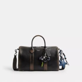 Borsa Compass 35 in pelle invecchiata con ciondoli