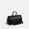 Borsa Compass 35 in pelle invecchiata con ciondoli