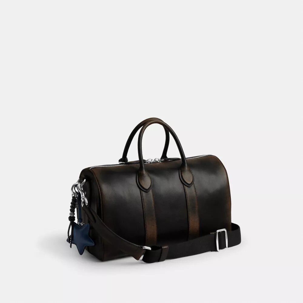 Borsa Compass 35 in pelle invecchiata con ciondoli