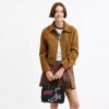 Borsa Disney X Coach Rogue 25 con Pluto