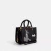 Borsa Disney X Coach Rogue 25 con Pluto