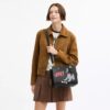 Borsa Disney X Coach Rogue 25 con Pluto