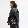 Borsa Disney X Coach Rogue 25 con Pluto
