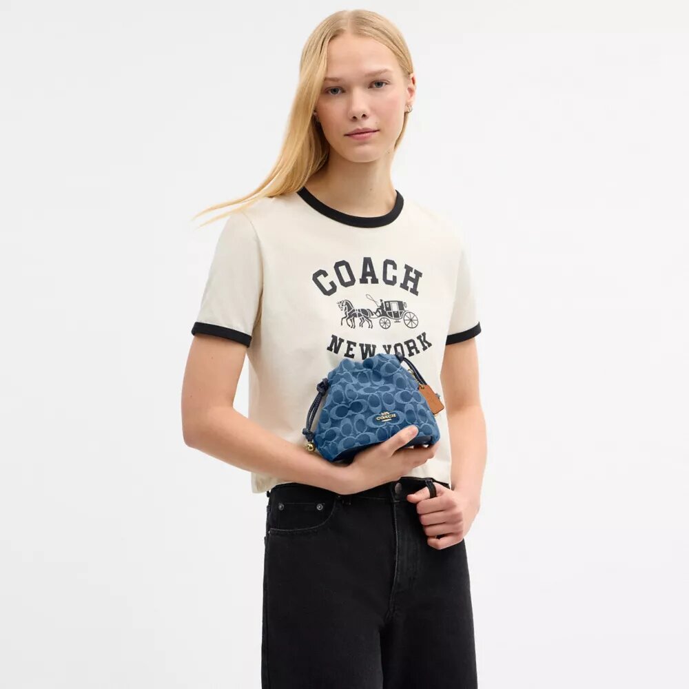 Borsa Faye Mini con coulisse in denim Signature
