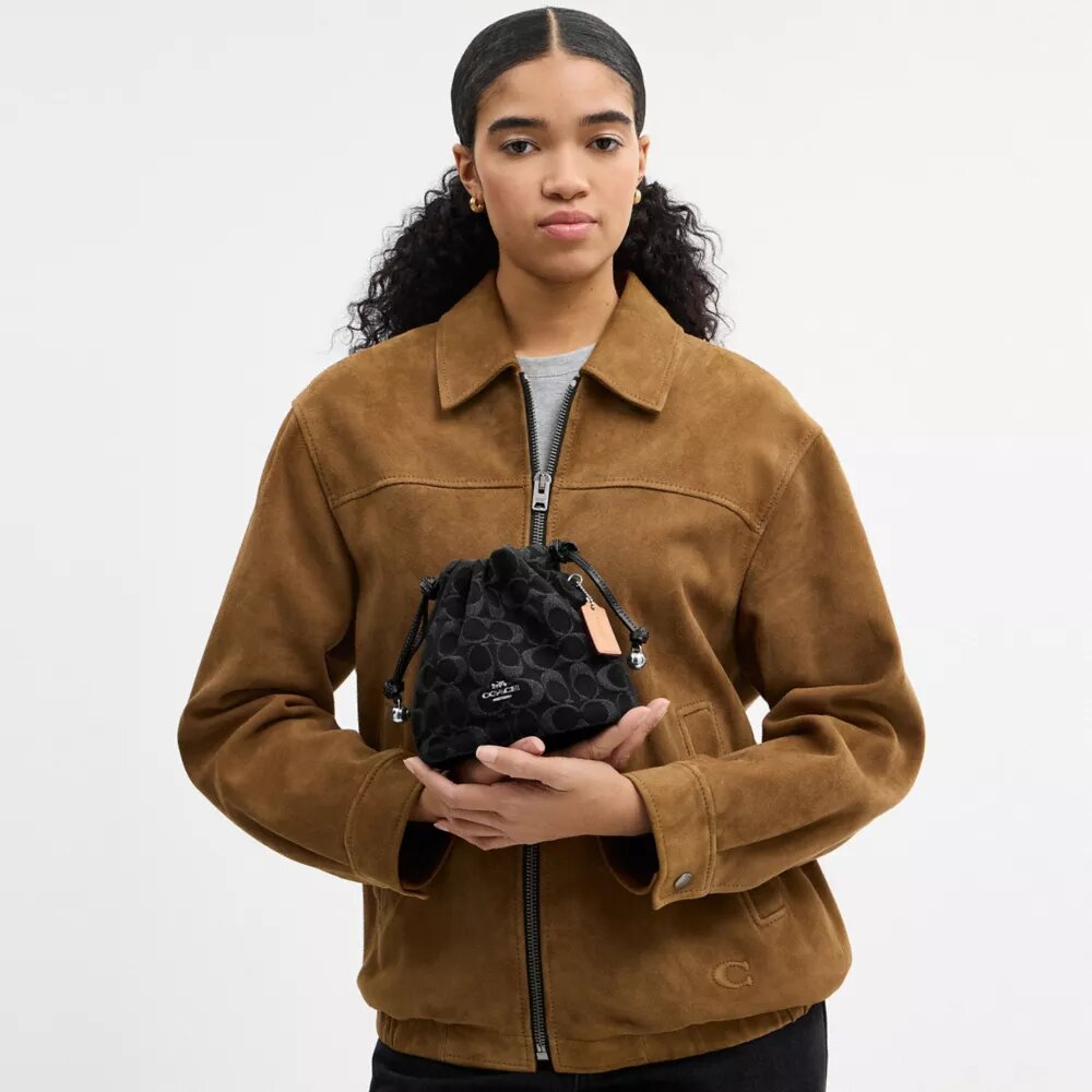 Borsa Faye Mini con coulisse in denim Signature
