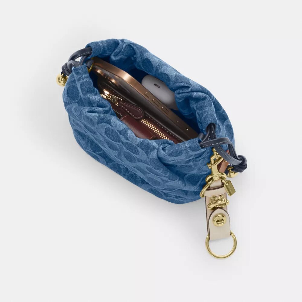 Borsa Faye Mini con coulisse in denim Signature