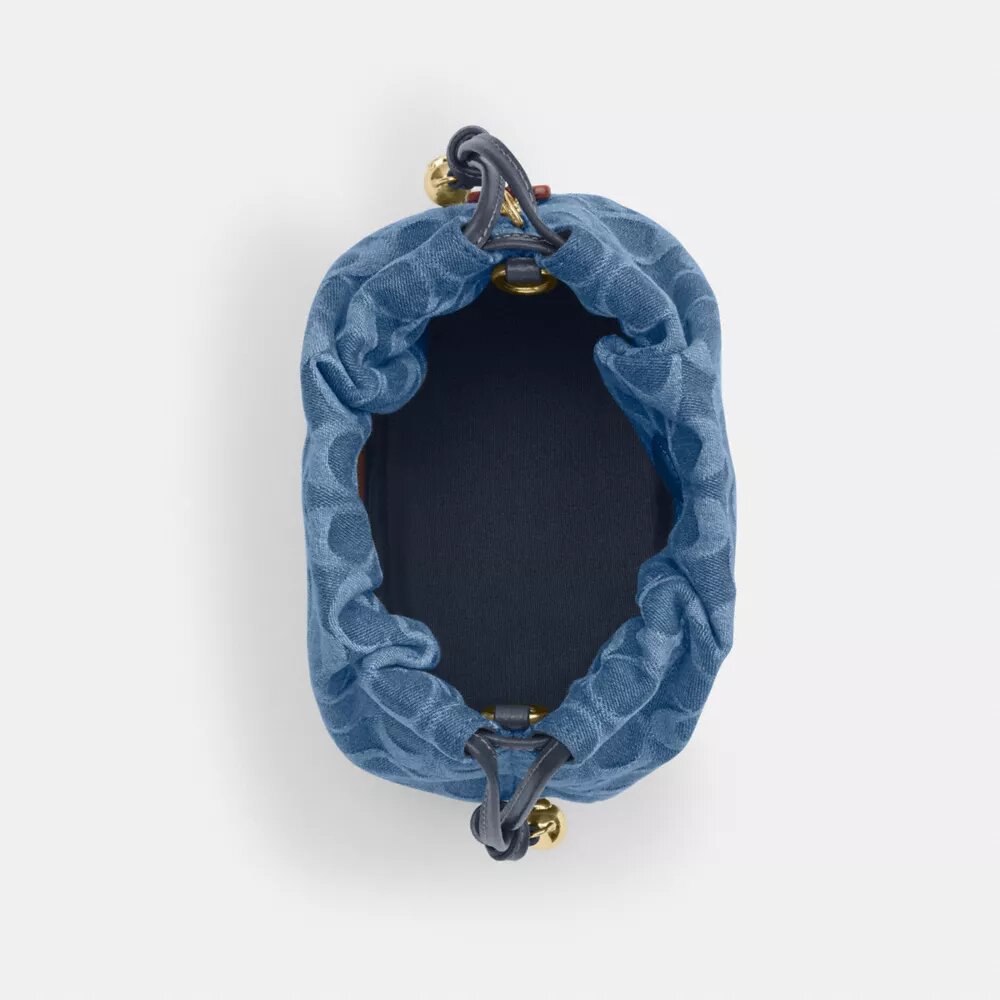 Borsa Faye Mini con coulisse in denim Signature